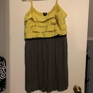 Gray and mustard color dress.